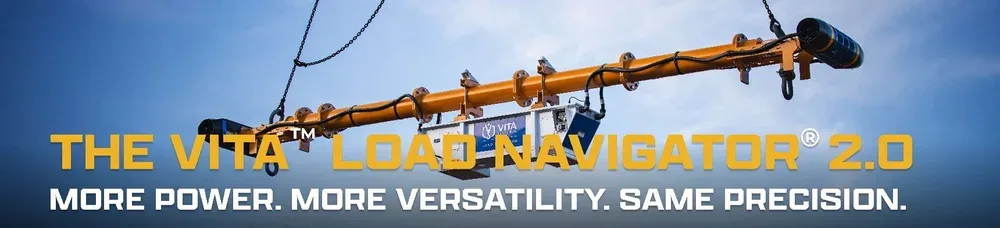 A large orange crane lifts a cleaning or inspection device with a camera at the end of a pole, against a cloudy sky background.