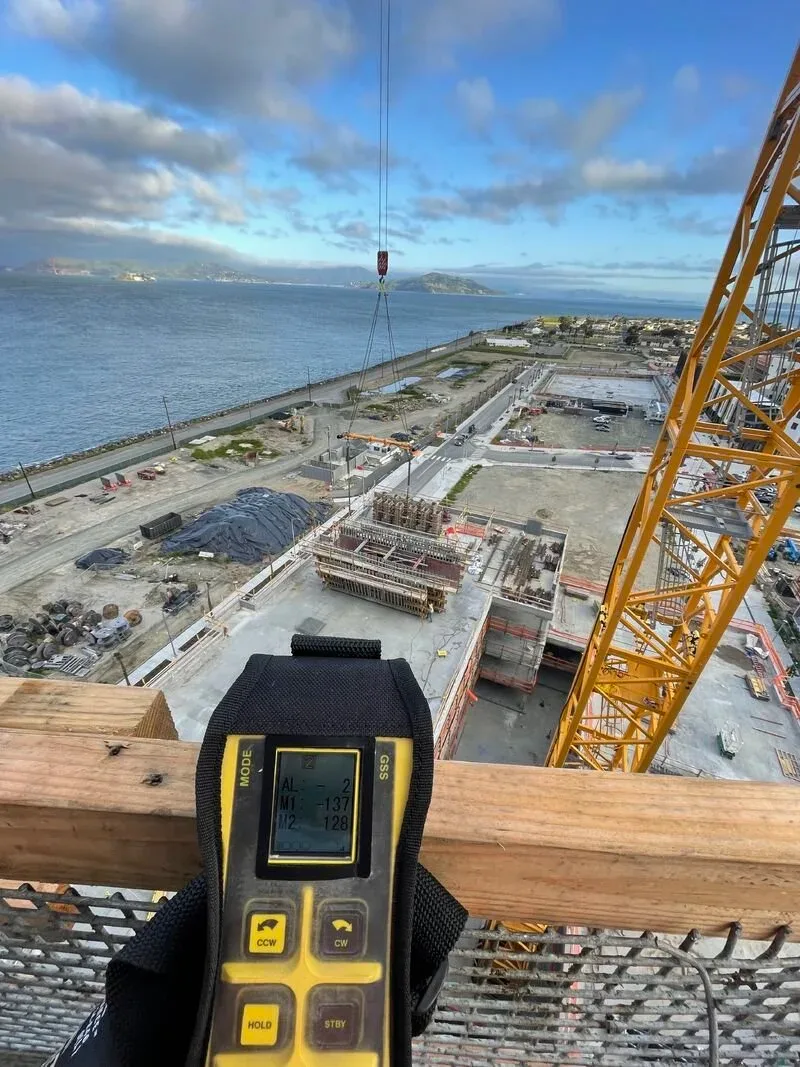 Operator with a VLN remote pendant overlooking a construction site