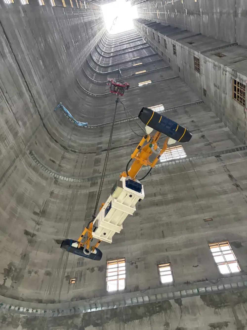 Vita Load Navigator suspended inside a tall concrete shaft